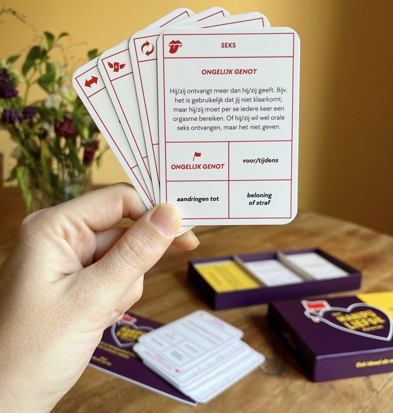 Een hand met kaarten uit het kwartet